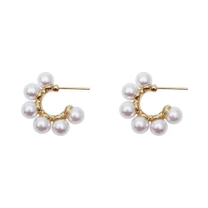 women C-shaped pearl Stud Design s925 Silver Pin earrings light luxury earrings.