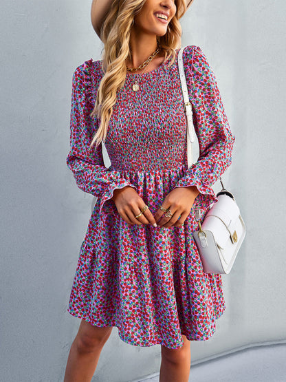A versatile and stylish round neck floral dress for spring and summer, featuring a long-sleeved A-line skirt. Perfect for all occasions and effortlessly chic.