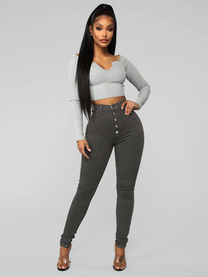 Stylish Women's Button Blouse paired with High Waist Ankle Skinny Jeans - Trendy Outfit for Women - Fashionable Clothing Combination.